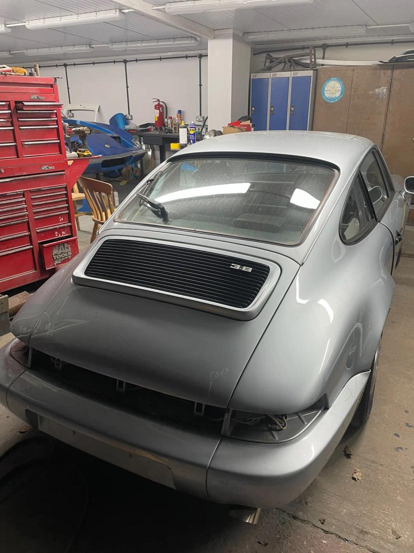 Porsche 911 bodyshell in bare metal