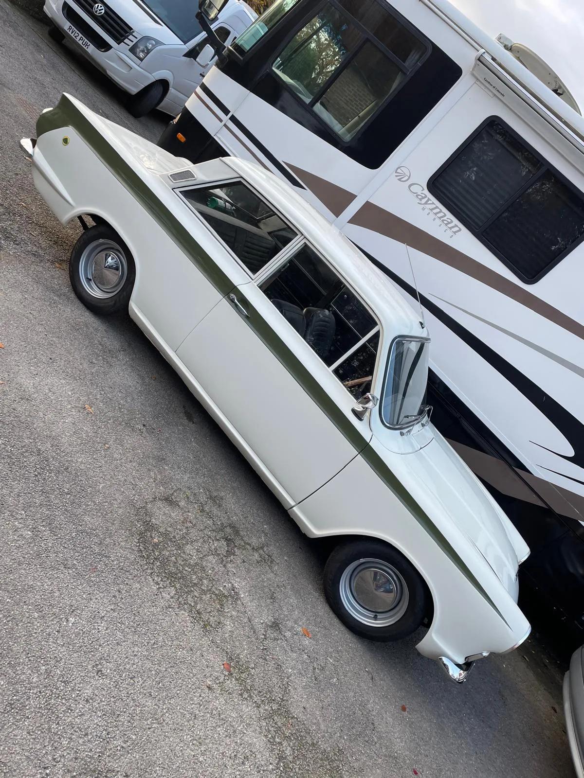 Ford cortina mk1 two-door; lotus cortina-style livery, verify provenance at Welch Automotive